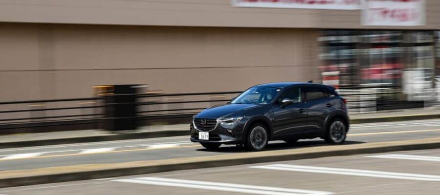 Shows a driving Mazda CX-5 from Sixt